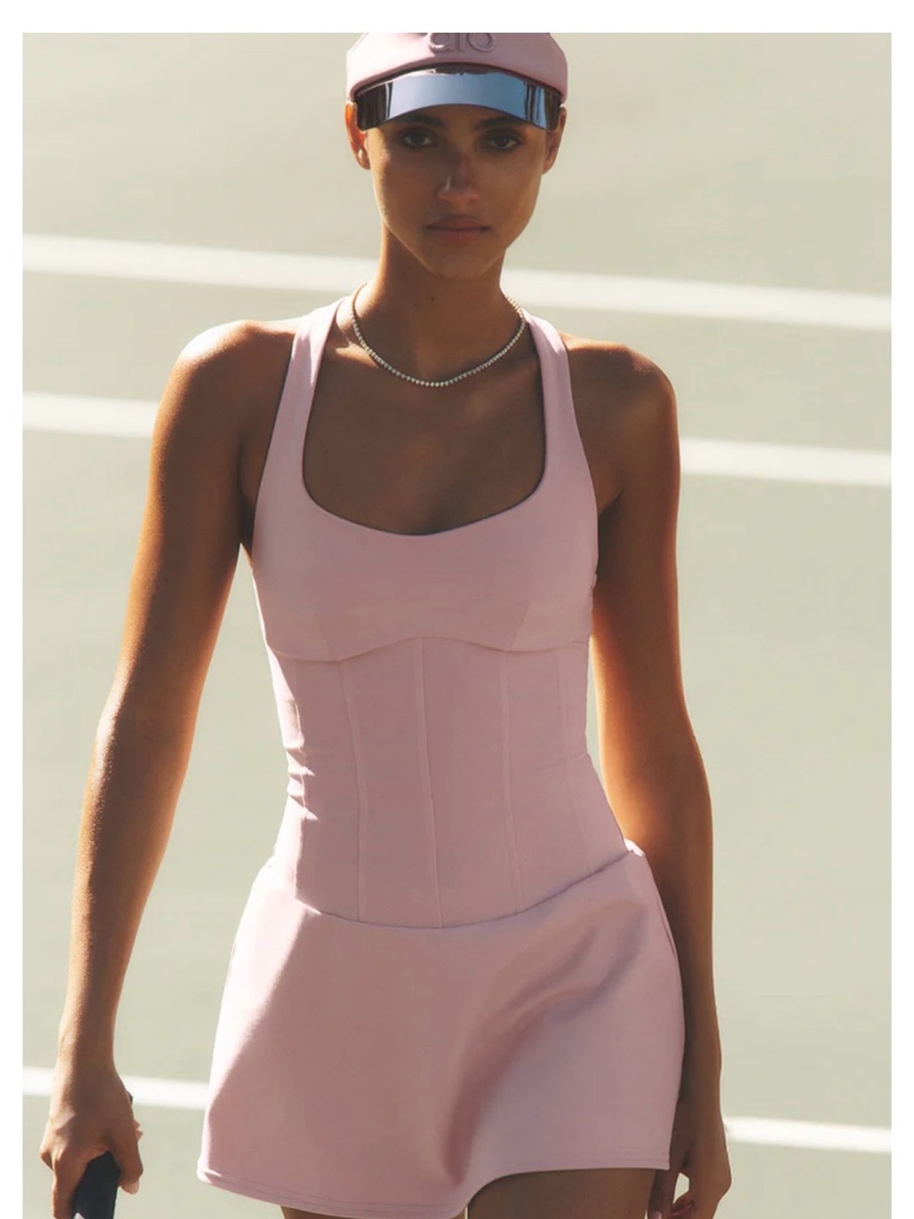 ALO Yoga Airbrush Sparks Fly Corset Tennis Dress in dusty pink